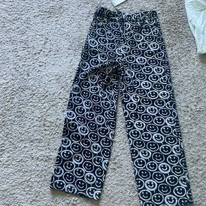 Black and white smiley face jeans